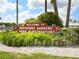 Inviting community sign for Bayshore Gardens Park & Recreation, surrounded by lush landscaping at 1000 Dartmouth Dr, Bradenton, FL 34207