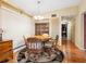 Charming dining room with a round table and wicker chairs at 1000 Dartmouth Dr, Bradenton, FL 34207