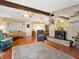 Living room features hardwood floors, fireplace, and lots of natural light at 1000 Dartmouth Dr, Bradenton, FL 34207