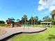 playground with swings and play structures at 1000 Dartmouth Dr, Bradenton, FL 34207