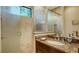 Bathroom with granite countertop and a walk-in shower at 1609 Palm View Rd, Sarasota, FL 34240