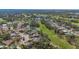 Aerial view showcasing home's location in golf community at 1965 White Feather Ln, Nokomis, FL 34275