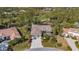 Property view showcasing home's location near golf course at 1965 White Feather Ln, Nokomis, FL 34275