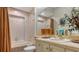 Clean bathroom with updated vanity and bathtub at 1965 White Feather Ln, Nokomis, FL 34275