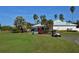 Community clubhouse with golf cart parking at 1965 White Feather Ln, Nokomis, FL 34275