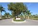 Inviting entrance to Calusa Lakes community at 1965 White Feather Ln, Nokomis, FL 34275