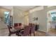 Formal dining room with a modern table and chairs at 1965 White Feather Ln, Nokomis, FL 34275