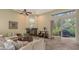 Relaxing Gathering room with fireplace and access to the lanai at 1965 White Feather Ln, Nokomis, FL 34275