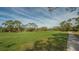 Landscaped golf course with walking path at 1965 White Feather Ln, Nokomis, FL 34275
