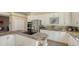 Modern kitchen with stainless steel appliances and granite countertops at 1965 White Feather Ln, Nokomis, FL 34275