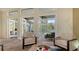 Spacious sitting area with pool and patio access at 1965 White Feather Ln, Nokomis, FL 34275