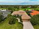 Luxury home with tile roof and paver driveway, near golf course at 2123 Calusa Lakes Blvd, Nokomis, FL 34275