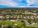 Wide view of community with golf course and lake at 2123 Calusa Lakes Blvd, Nokomis, FL 34275
