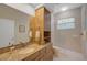 Bathroom with granite countertop and a walk-in shower at 2123 Calusa Lakes Blvd, Nokomis, FL 34275