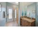 Guest bathroom with granite countertop and walk-in shower at 2123 Calusa Lakes Blvd, Nokomis, FL 34275