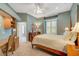 Guest bedroom with a built-in desk and en-suite bathroom at 2123 Calusa Lakes Blvd, Nokomis, FL 34275
