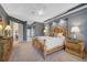Spacious Primary bedroom with large bed and ensuite bathroom access at 2123 Calusa Lakes Blvd, Nokomis, FL 34275