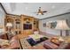 Large living room with hardwood floors and a cozy seating area at 2123 Calusa Lakes Blvd, Nokomis, FL 34275