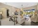 Bright and airy living room with access to the backyard and pool at 2123 Calusa Lakes Blvd, Nokomis, FL 34275