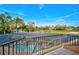 Private pool and screened patio overlooking a golf course at 2123 Calusa Lakes Blvd, Nokomis, FL 34275