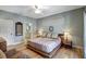 Relaxing bedroom with platform bed and ceiling fan at 2139 Hawthorne St, Sarasota, FL 34239