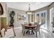 Bright dining room with French doors leading to patio at 2139 Hawthorne St, Sarasota, FL 34239