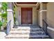 Elegant front entry with double doors and tile flooring at 2139 Hawthorne St, Sarasota, FL 34239
