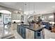 Modern kitchen with a large island, stainless steel appliances, and open floor plan at 2139 Hawthorne St, Sarasota, FL 34239