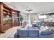 Open living room showcasing a built-in entertainment center and sectional sofa at 2139 Hawthorne St, Sarasota, FL 34239