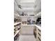 Well-organized pantry with ample shelving for storage at 2139 Hawthorne St, Sarasota, FL 34239