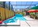 Relaxing pool and spa with a water feature and patio seating at 2139 Hawthorne St, Sarasota, FL 34239