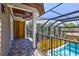 Outdoor balcony overlooking the pool and lush landscape at 2139 Hawthorne St, Sarasota, FL 34239