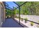 Enjoy the outdoors in this screened porch with a spacious deck at 2139 Hawthorne St, Sarasota, FL 34239