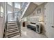 Modern curved staircase with wrought iron railing at 2139 Hawthorne St, Sarasota, FL 34239