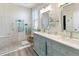 Elegant bathroom with dual sinks and walk-in shower at 2928 122Nd E Pl, Parrish, FL 34219