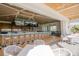 Upscale clubhouse bar with indoor and outdoor seating at 293 Turquoise Ln, Osprey, FL 34229