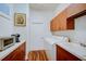 Convenient laundry room with washer, dryer and cabinets at 293 Turquoise Ln, Osprey, FL 34229