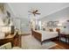 Large main bedroom with hardwood floors and sitting area at 293 Turquoise Ln, Osprey, FL 34229