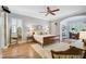 Spacious main bedroom with hardwood floors and an en-suite bathroom at 293 Turquoise Ln, Osprey, FL 34229