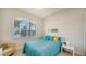 Bedroom with a full bed and an inviting armchair at 322 Siena Vista Pl, Sun City Center, FL 33573