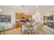 Kitchen features granite countertops and light wood cabinets at 322 Siena Vista Pl, Sun City Center, FL 33573