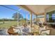Screened lanai offering a relaxing outdoor dining space at 322 Siena Vista Pl, Sun City Center, FL 33573