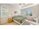 Spacious main bedroom with king-size bed and large window at 322 Siena Vista Pl, Sun City Center, FL 33573