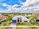 Luxury home with water view and lush landscaping at 4779 Pastel Ct, Sarasota, FL 34240