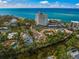 Waterfront home with private pool and lush landscaping near the ocean at 4817 Ocean Blvd, Sarasota, FL 34242