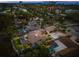 Aerial view of house and neighborhood at dusk at 4817 Ocean Blvd, Sarasota, FL 34242
