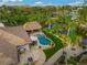 Luxury home with a pool, patio, and lush landscaping at 4817 Ocean Blvd, Sarasota, FL 34242