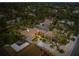 Aerial view of house and neighborhood at dusk at 4817 Ocean Blvd, Sarasota, FL 34242