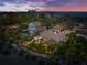 Aerial view of waterfront home at sunset at 4817 Ocean Blvd, Sarasota, FL 34242