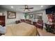 Bright bedroom with sitting area and hardwood floors at 4817 Ocean Blvd, Sarasota, FL 34242